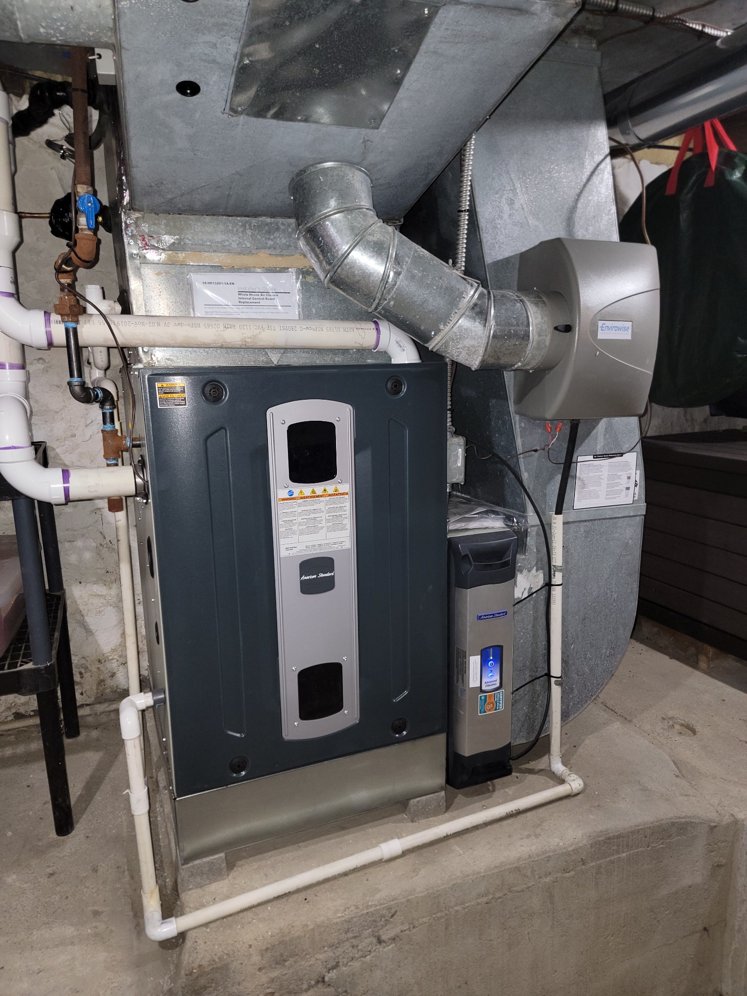 Electronic air cleaner and whole-home humidifier installed by EMH Mechanical