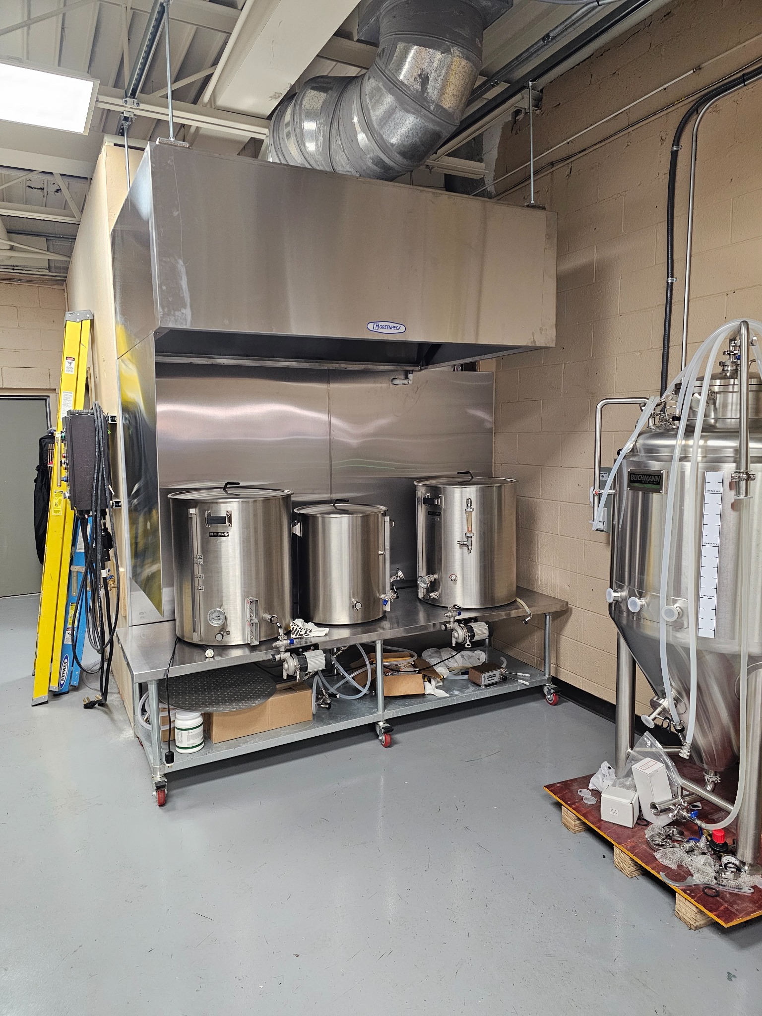 Commercial kitchen hood installed for a microbrewery by EMH Mechanical