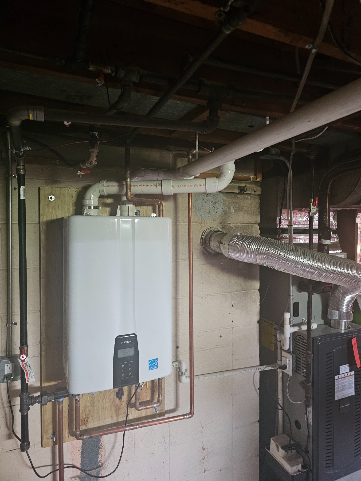 Navien high-efficiency tankless water heater installed by EMH Mechanical