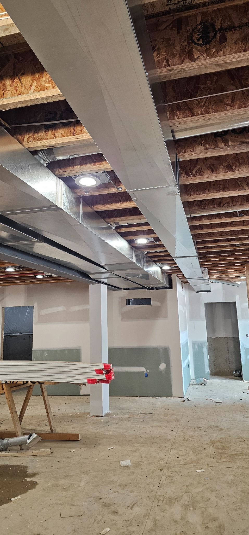 Supply and return ductwork installed by EMH Mechanical during new construction